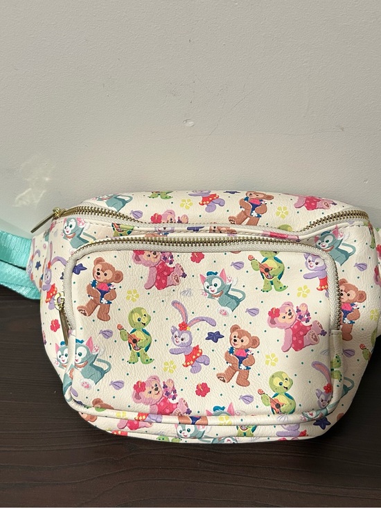 Loungefly Handbags - Loungefly Multicolor Aulani Character Print Waist Bag
